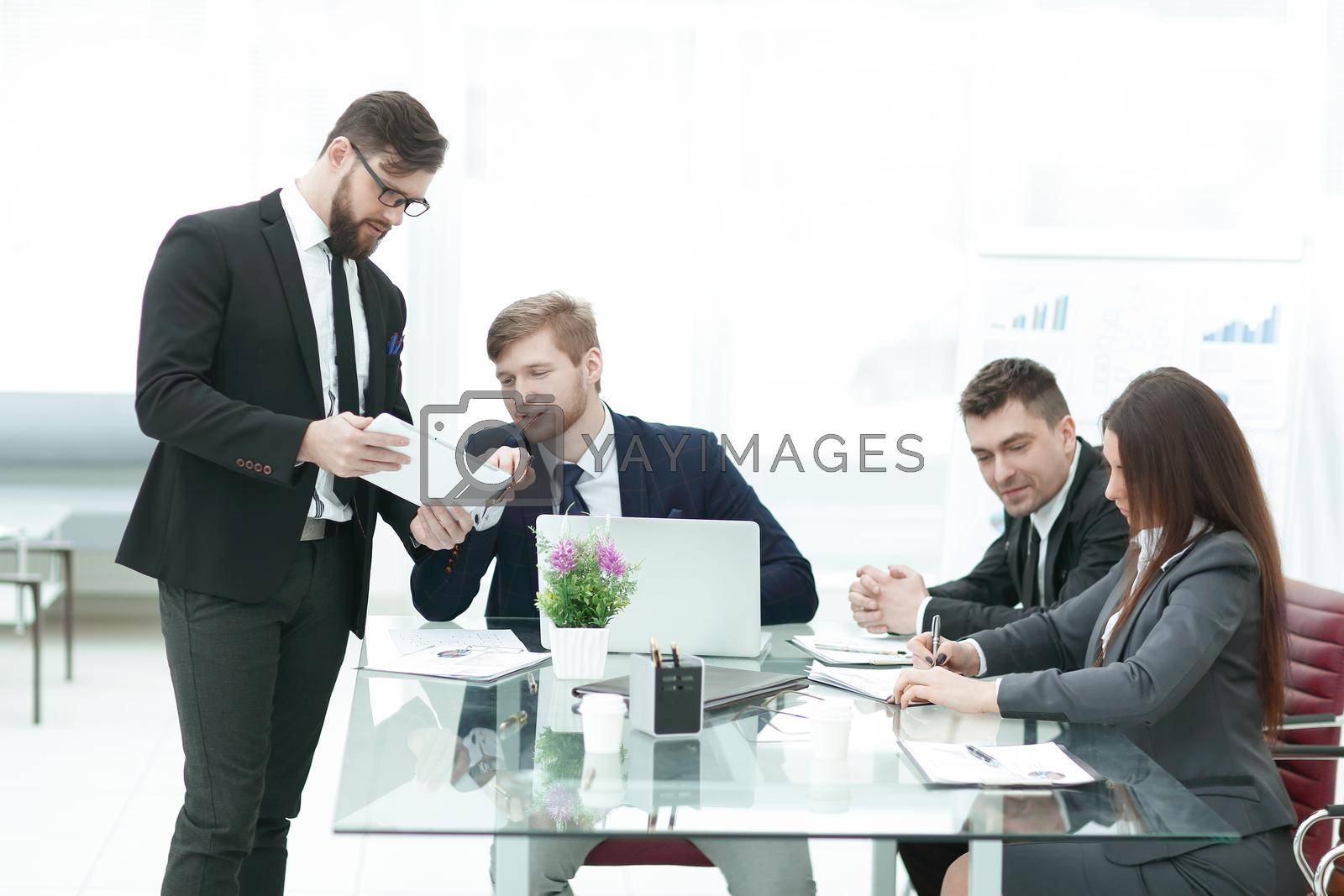 business team analyzes financial documents in a modern office.photo with copy space