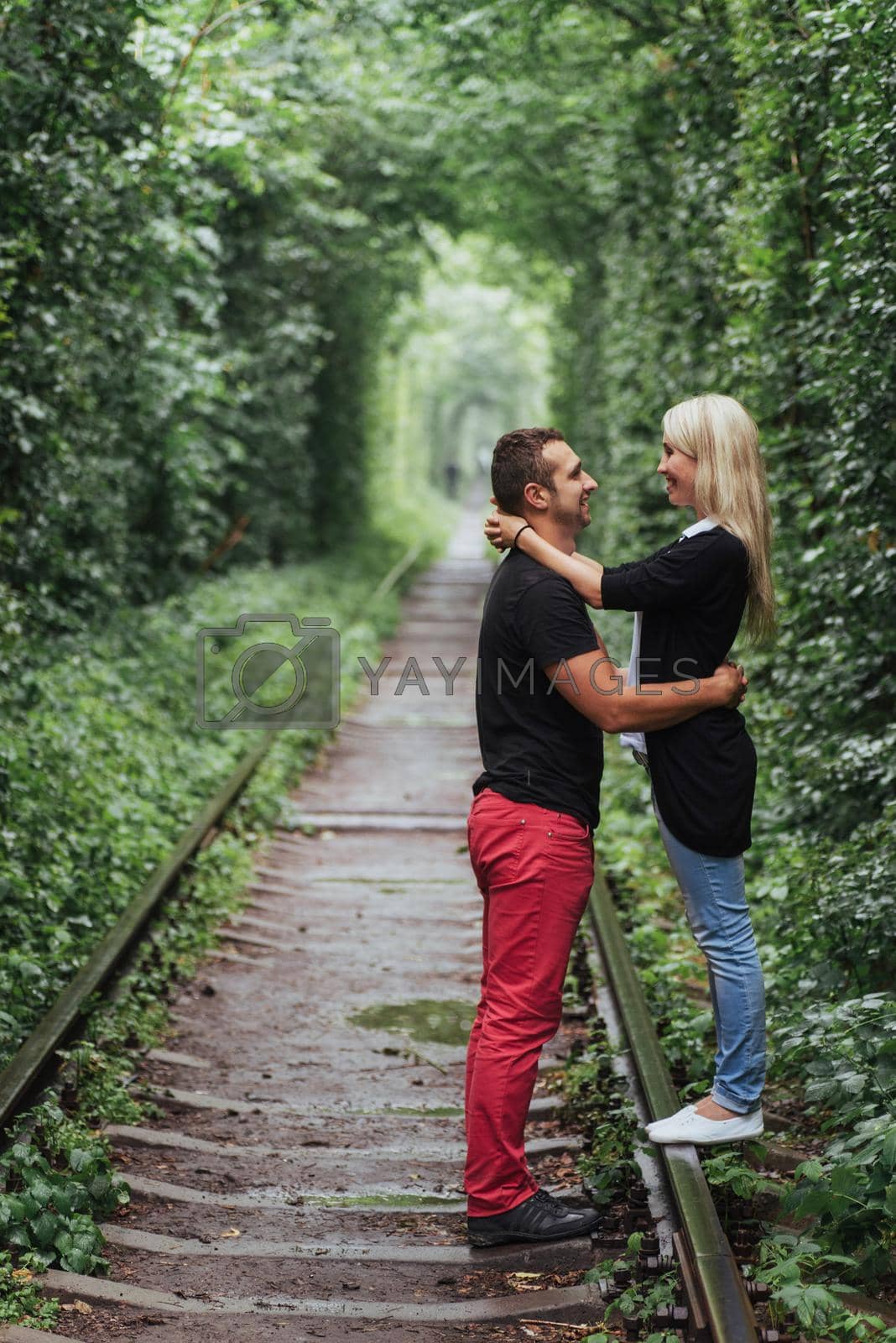 Royalty free image of Loving couple on the iron road. Ukraine. by Standret