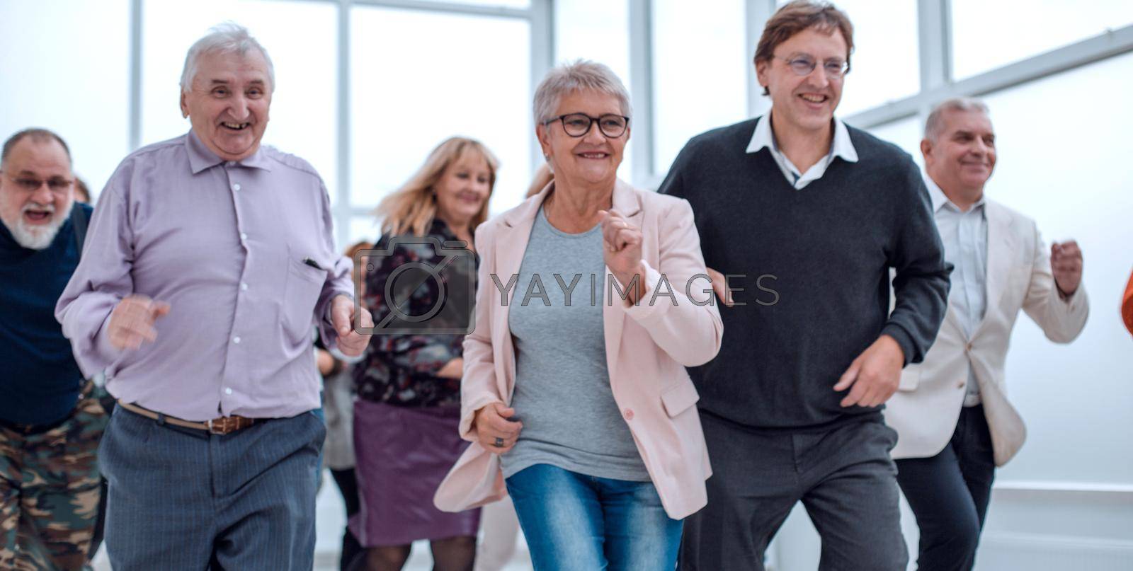 Royalty free image of jogging old happy friends. close-up marathon of mature people by asdf