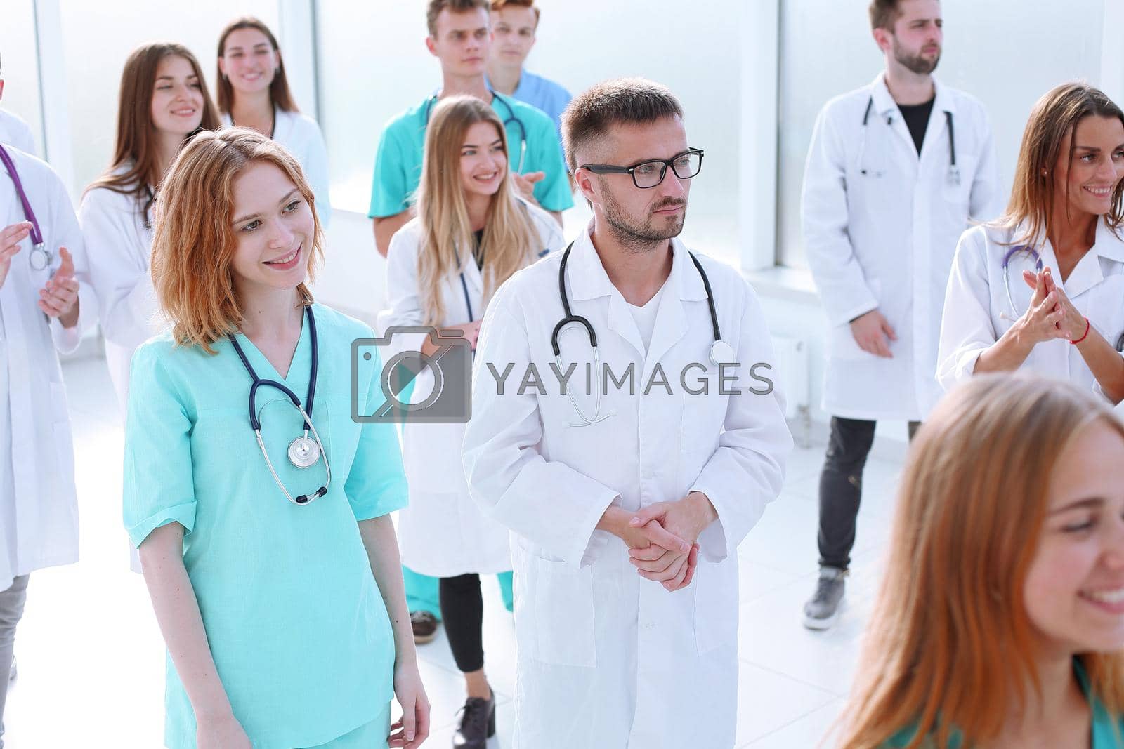 Royalty free image of group of medical professionals showing thumbs up by asdf