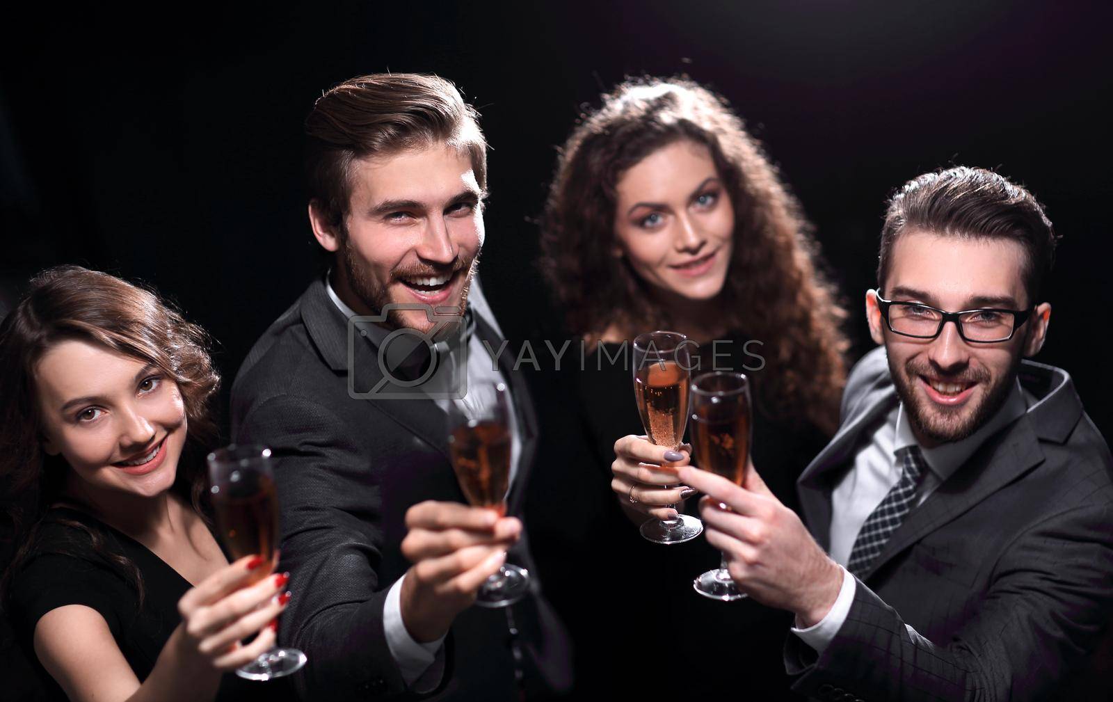 happy young people with a glass of wine.isolated on a black background.