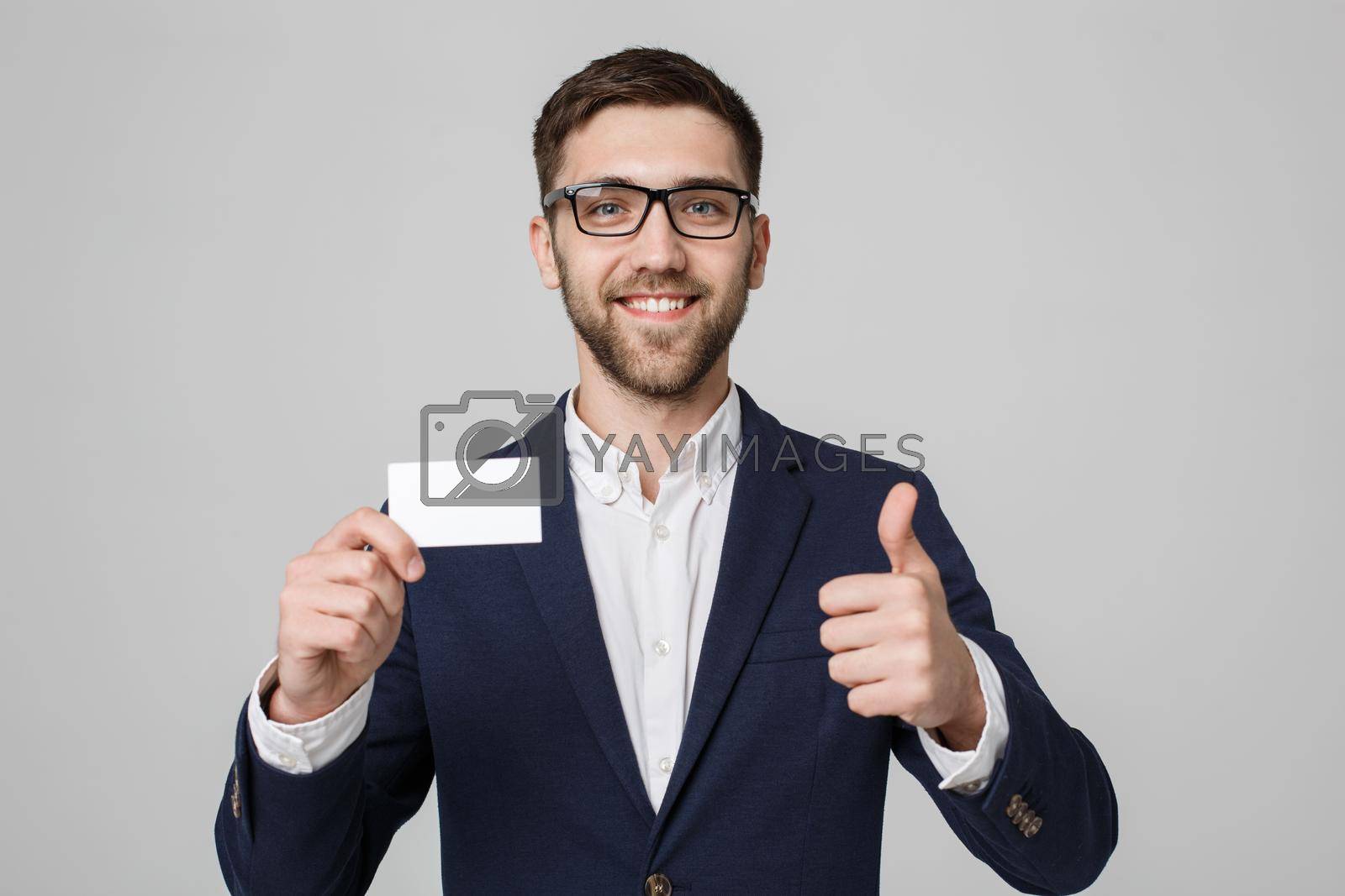 Royalty free image of Business Concept - Portrait Handsome Business man showing name card with smiling confident face and thump up. White Background.Copy Space. by Benzoix