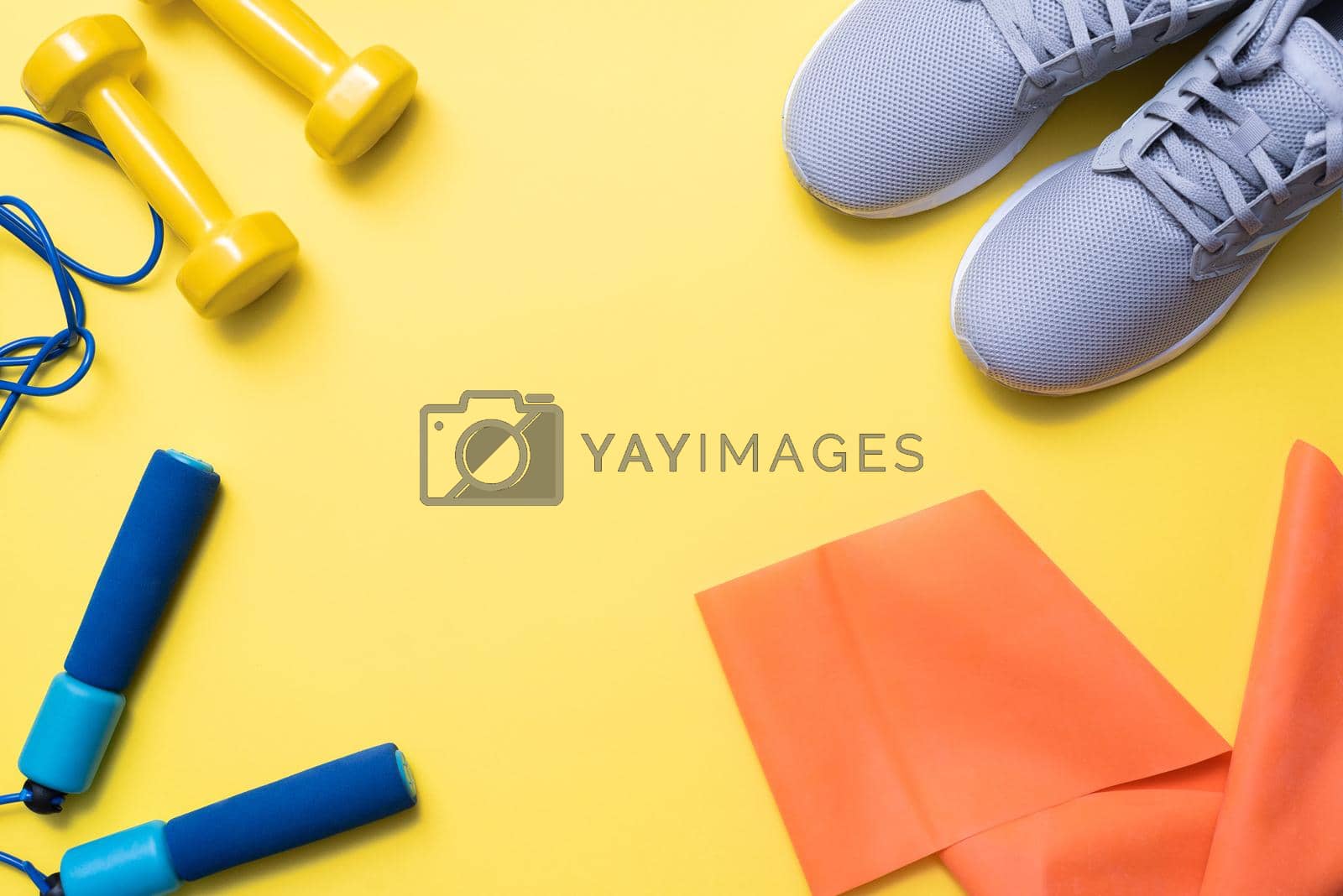 Royalty free image of Exercise equipment and empty space for text. Flat lay, copy space by etonastenka