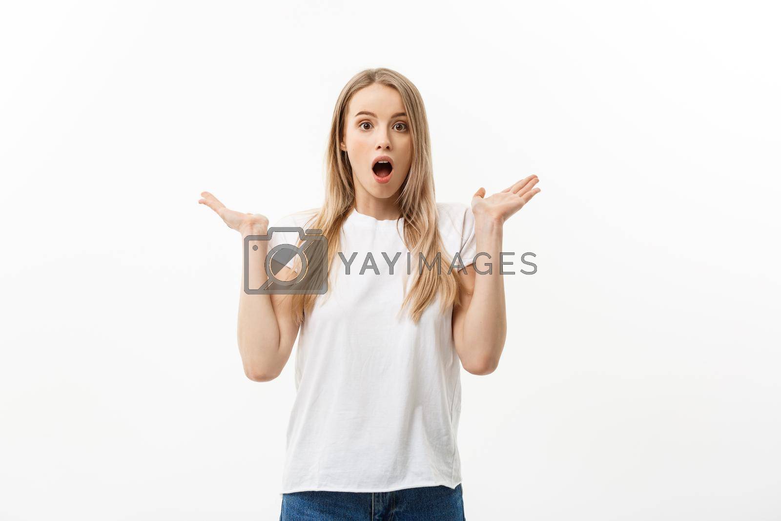 Royalty free image of Lifestyle Concept: Portrait of a scared frightened girl standing and surprising facial expression isolated over white background. by Benzoix