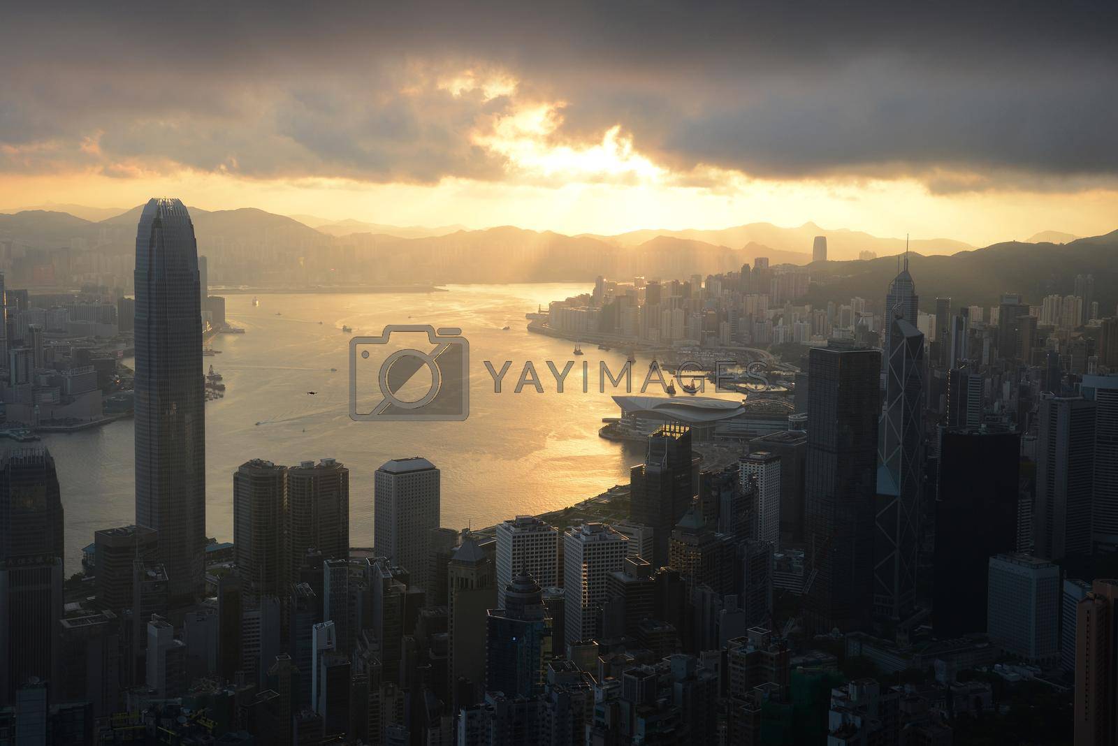 Royalty free image of sunrise from the peak by porbital