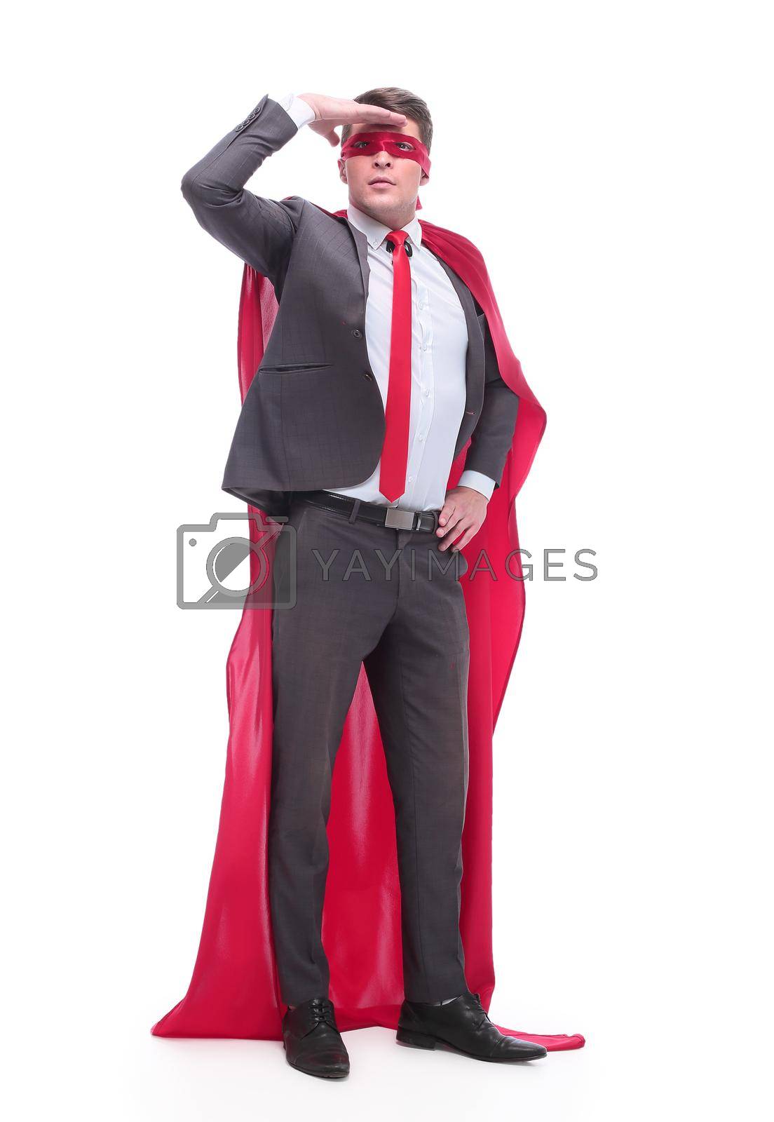 Royalty free image of attentive superhero businessman looking into the distance by asdf