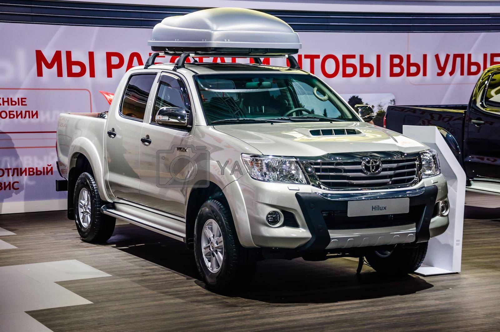 MOSCOW, RUSSIA - AUG 2012: NISSAN HILUX DOUBLE CAB 6TH GENERATION presented as world premiere at the 16th MIAS (Moscow International Automobile Salon) on August 30, 2012 in Moscow, Russia