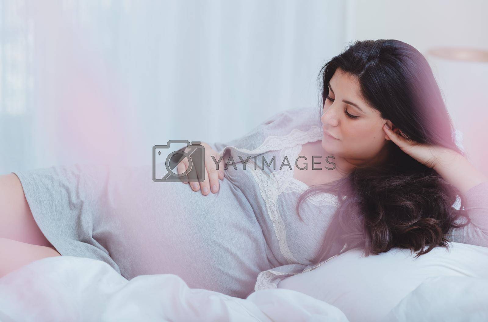 Royalty free image of Happy Female Enjoying Pregnancy by Anna_Omelchenko