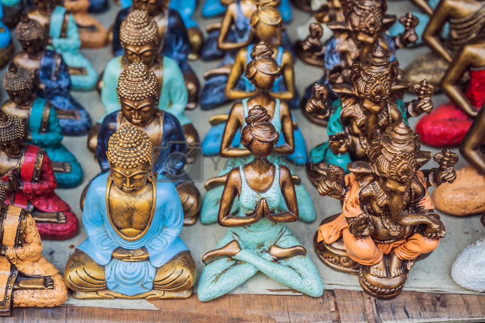 Royalty free image of Typical souvenir shop selling souvenirs and handicrafts of Bali at the famous Ubud Market, Indonesia. Balinese market. Souvenirs of wood and crafts of local residents by galitskaya