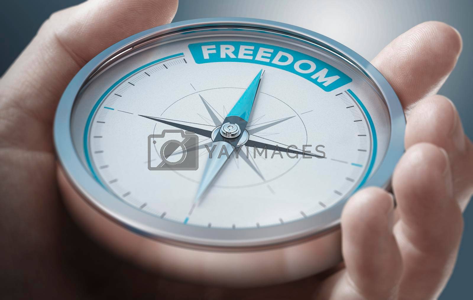 Freedom, being independant concept. Hand holding a conceptual compass. Composite image between a hand photography and a 3D background.