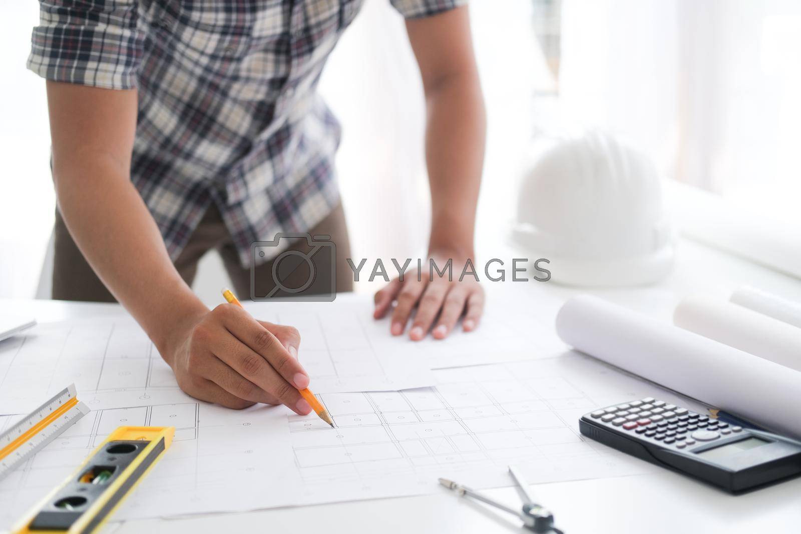 Royalty free image of Architectural building design and construction plans. by ijeab