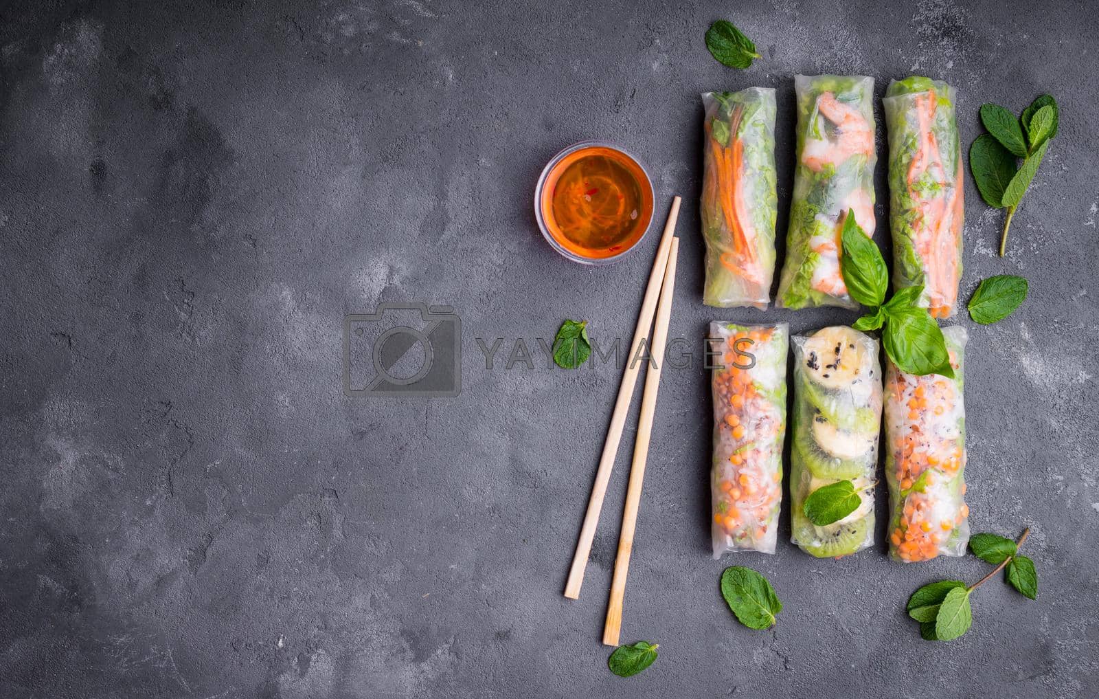 Royalty free image of Fresh assorted spring rolls by its_al_dente