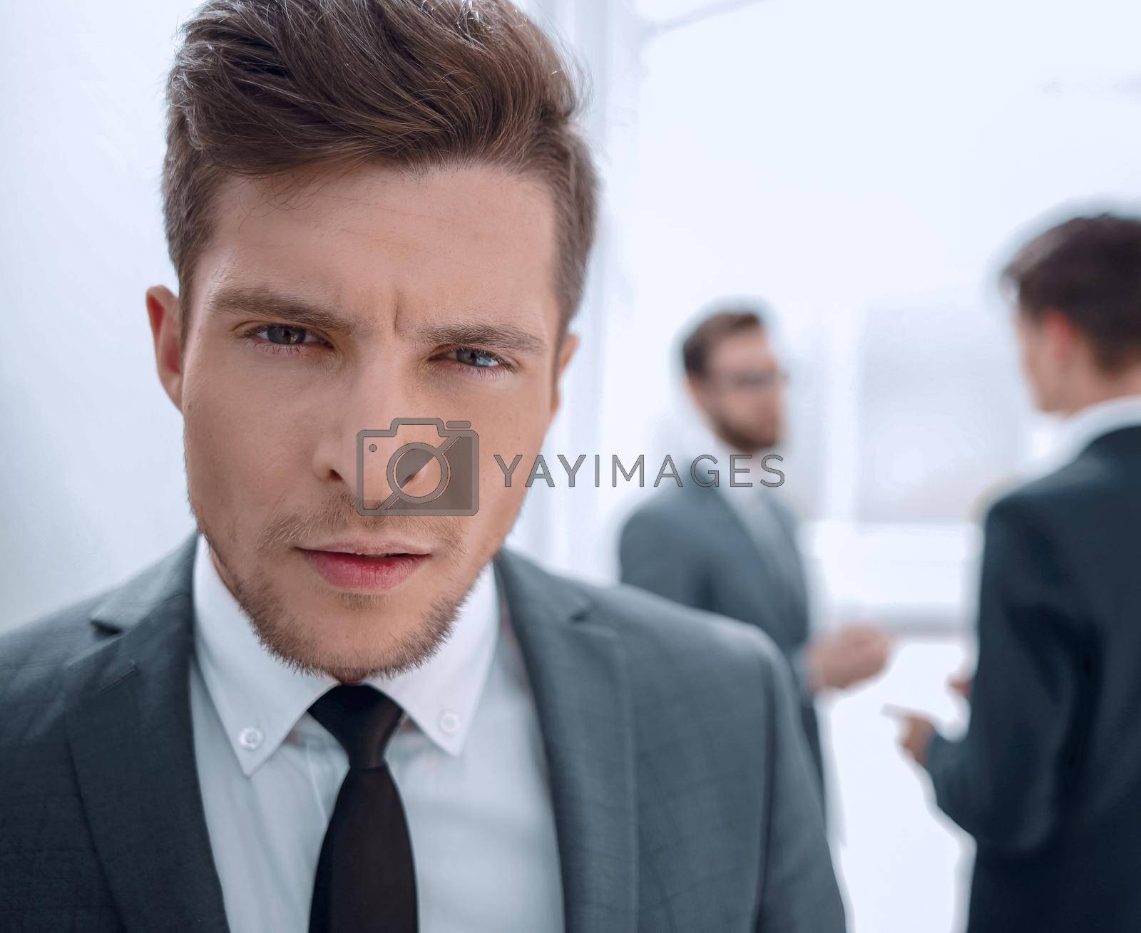 Royalty free image of close up.portrait of a serious young businessman by asdf