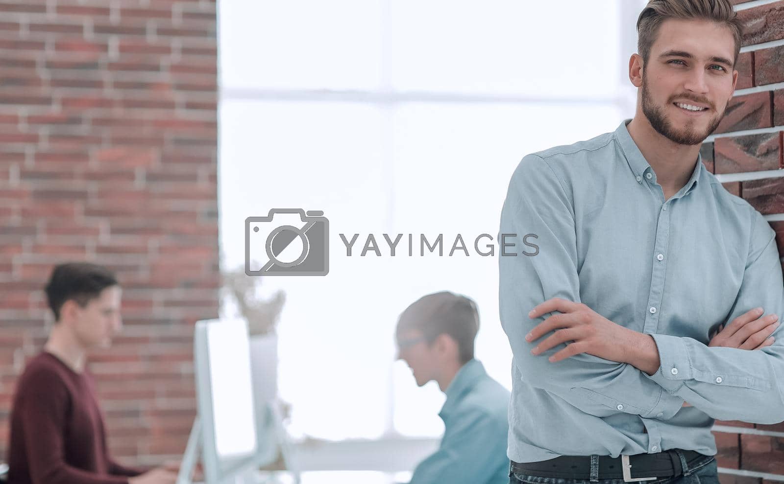 Royalty free image of Handsome smiling confident businessman portrait. by asdf