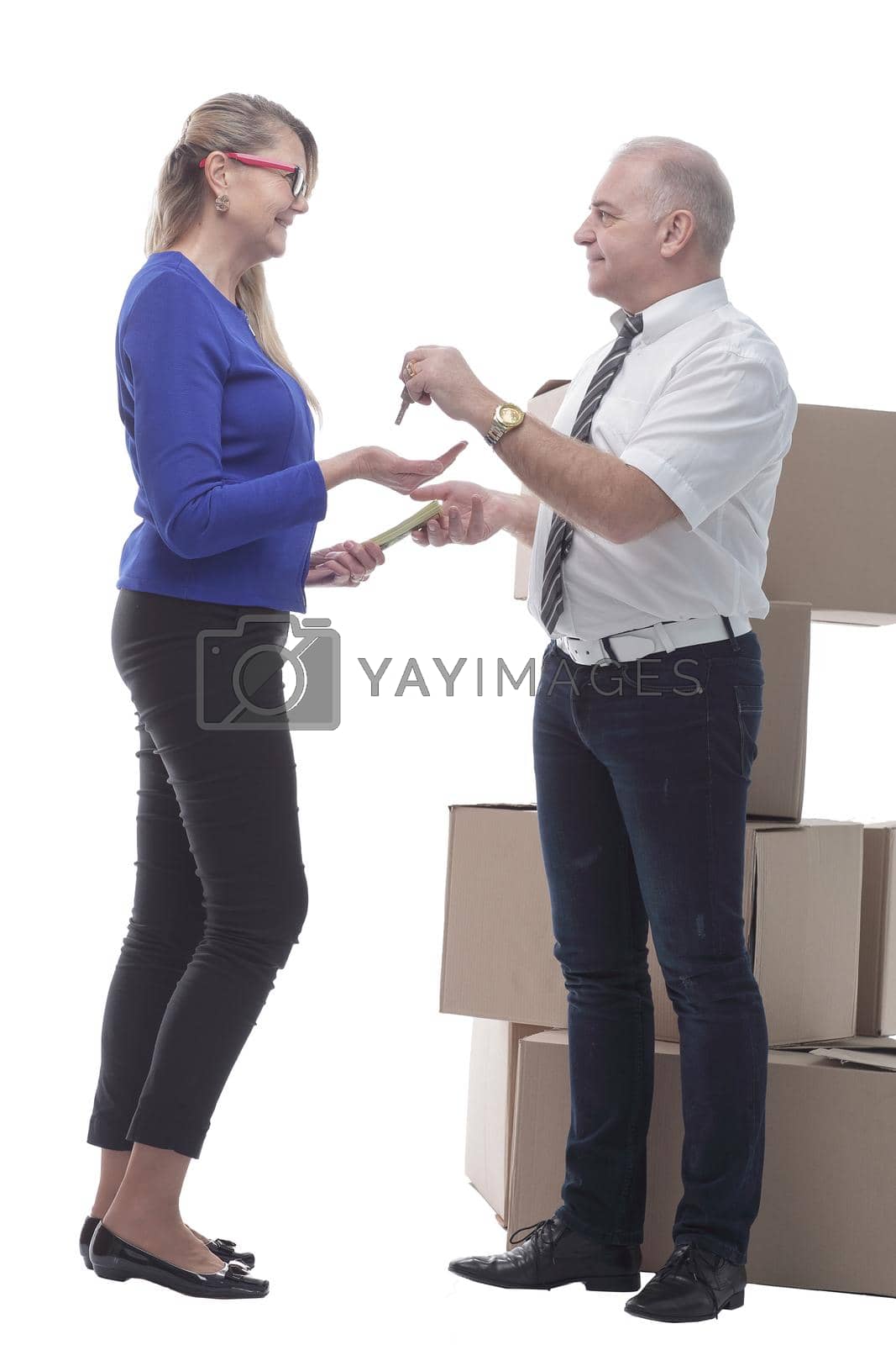Royalty free image of in full growth. real estate agent handing keys to a happy buyer by asdf