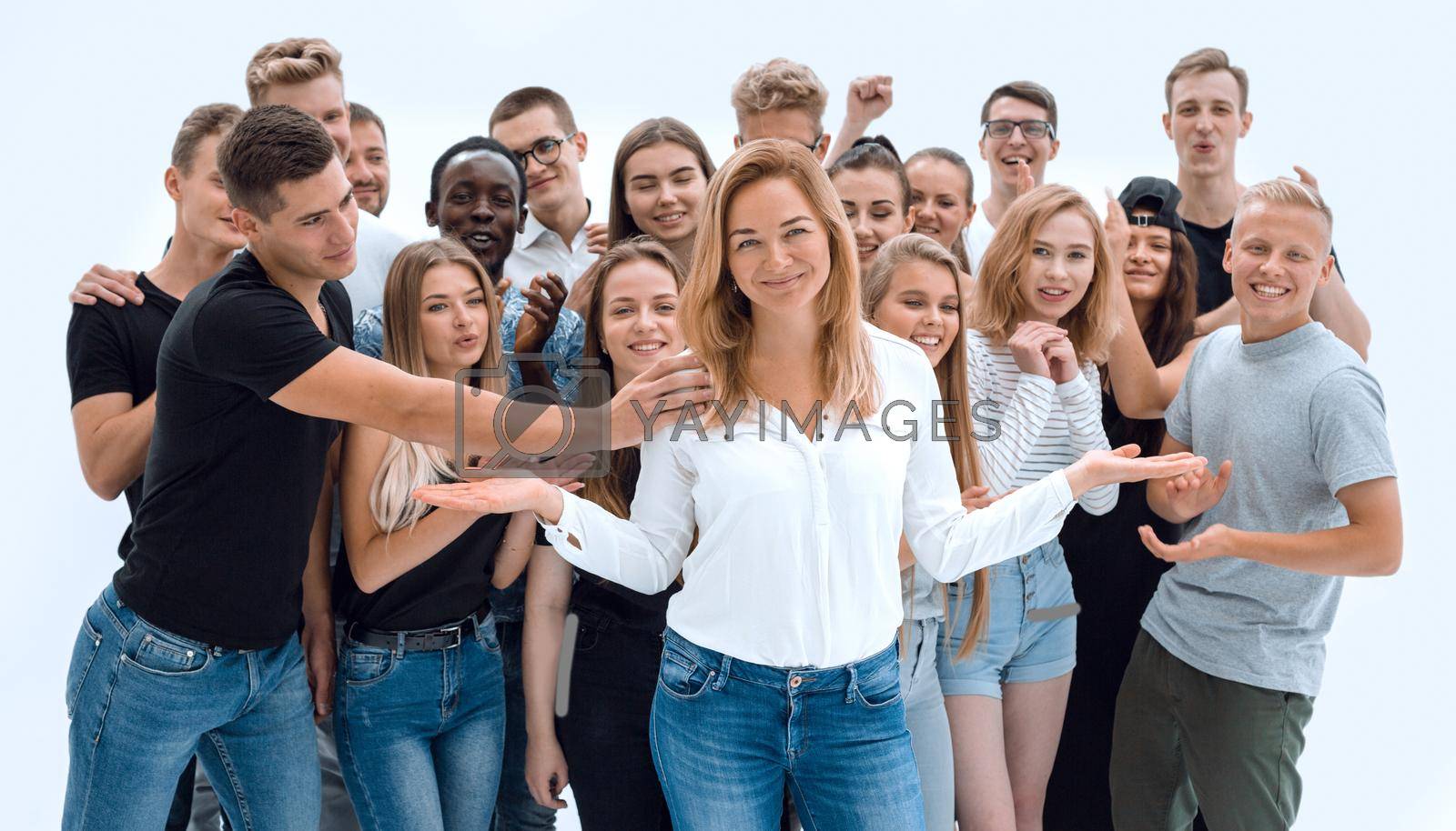 Royalty free image of confident young woman leader standing in front of her associates by asdf