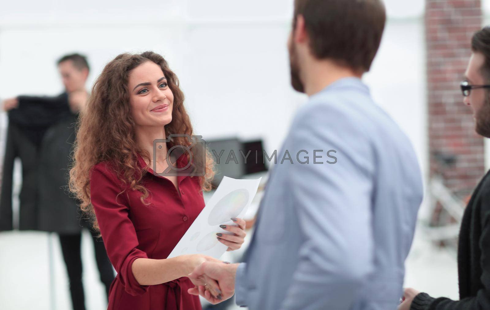 Royalty free image of handshake between the designer and the client by asdf