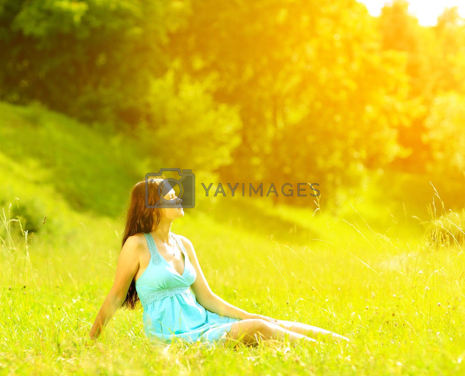 Royalty free image of Beauty Girl Outdoors enjoying nature by SmartPhotoLab