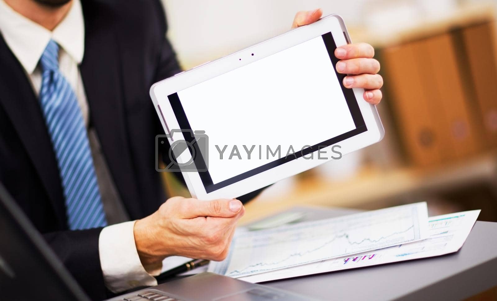 Businessman hands are holding the touch screen device.