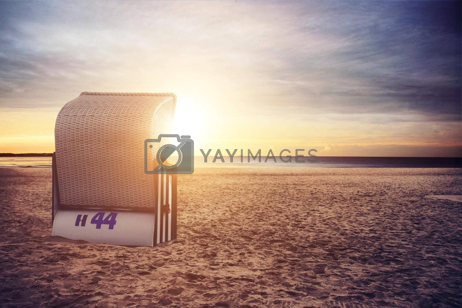 Royalty free image of Stormy baltic sea with beach chairs and coastal dunes. by Taut