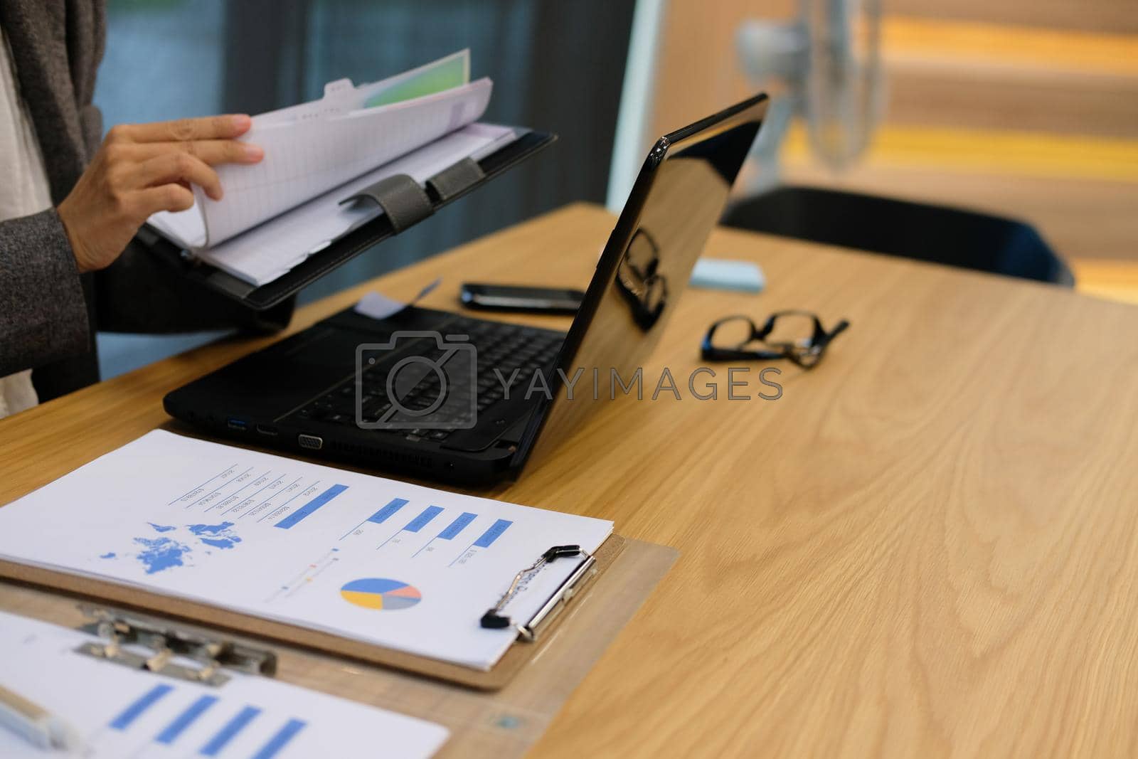 Royalty free image of woman with notebook working organizing plan at workplace by pp99
