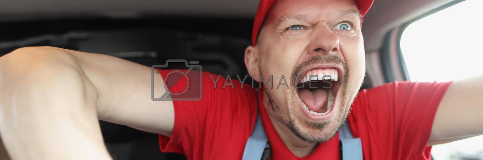Royalty free image of Guy with crazy facial expression by kuprevich