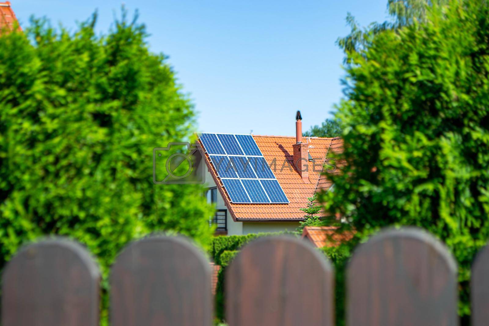 Royalty free image of House roof with photovoltaic modules by milastokerpro