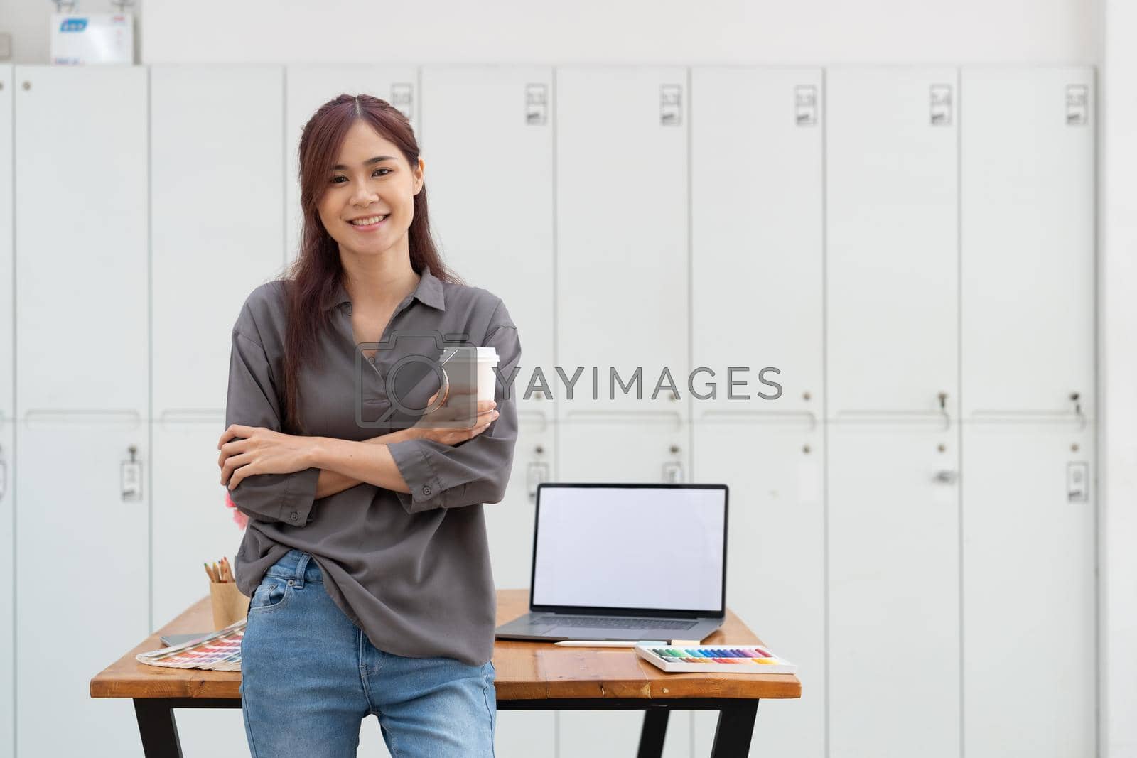 Royalty free image of Portrait of graphic designer asian woman creative on artist workplace. by nateemee