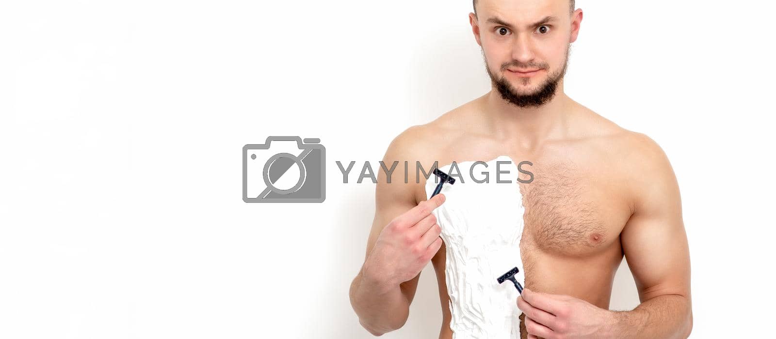 Royalty free image of Young man shaving his chest by okskukuruza