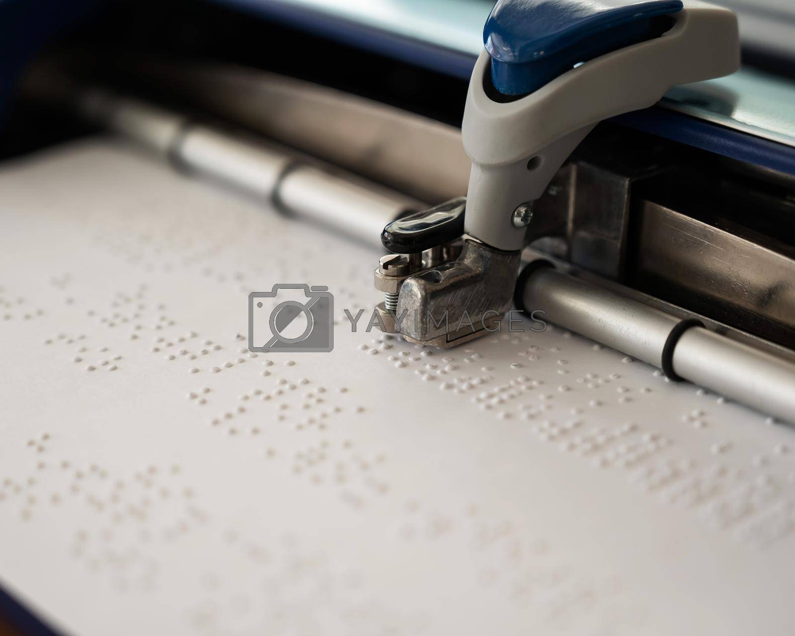Royalty free image of Close-up of a braille code printing machine. by mrwed54