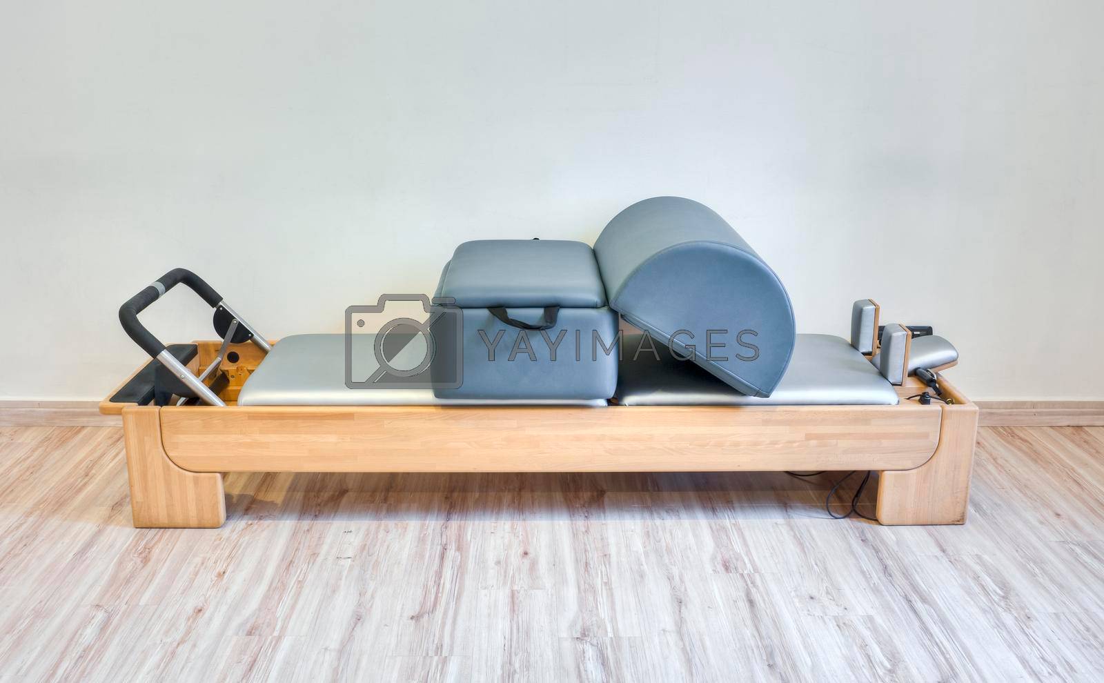 Royalty free image of Pilates fitness machine in a gym club by SimmiSimons