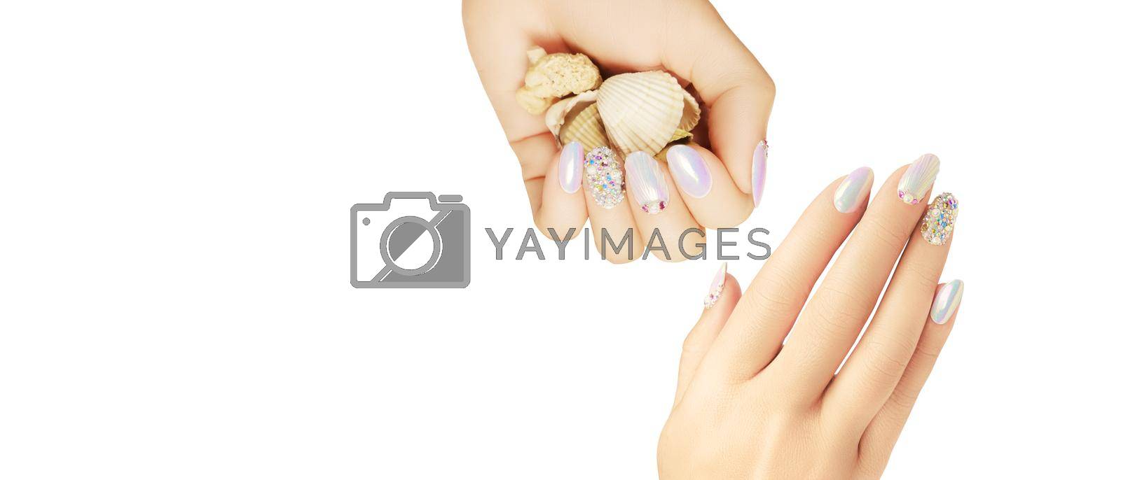 Royalty free image of Summer fashion and beauty hand care concept with seashells by Taut