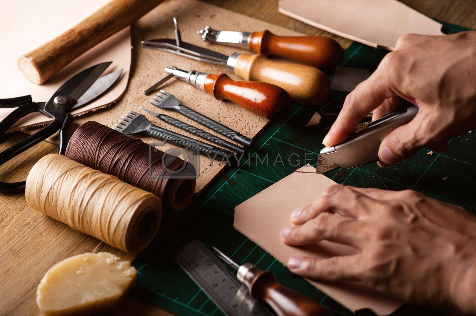 Royalty free image of working with vegetable tanned leather by norgal