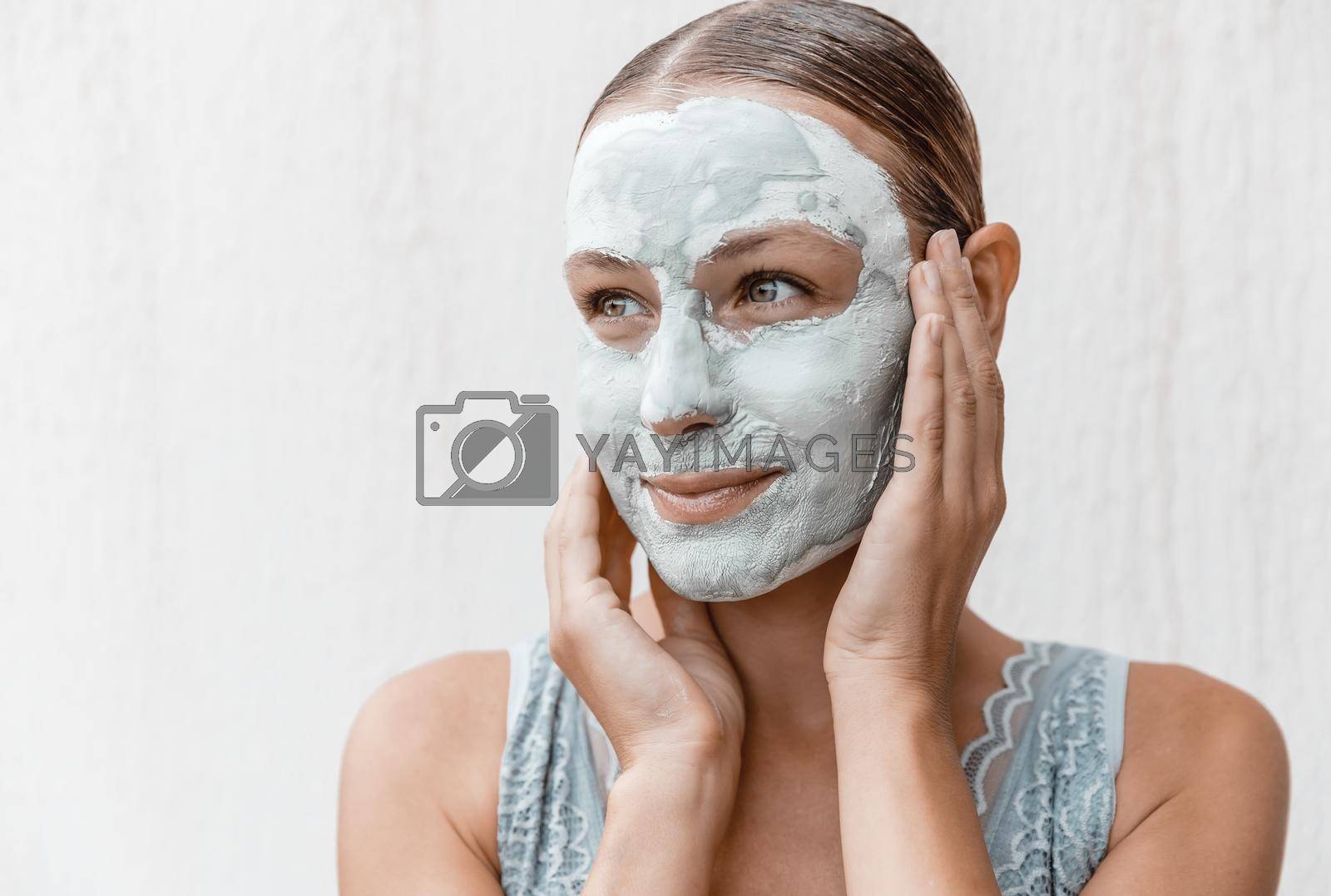 Royalty free image of Beautiful Woman Using Facial Mask by Anna_Omelchenko