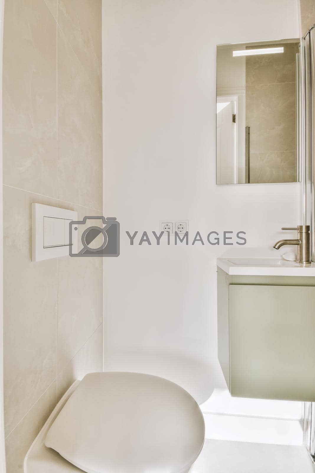 Royalty free image of Tap near sink and mirror by casamedia