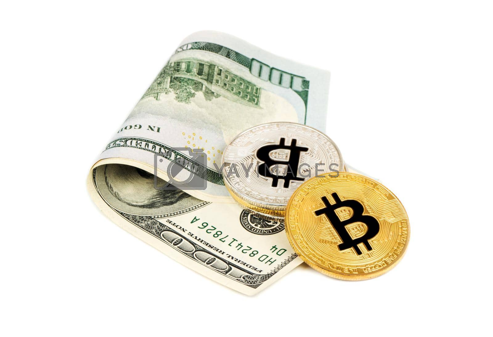Royalty free image of Bitcoin coins with dollars by andregric