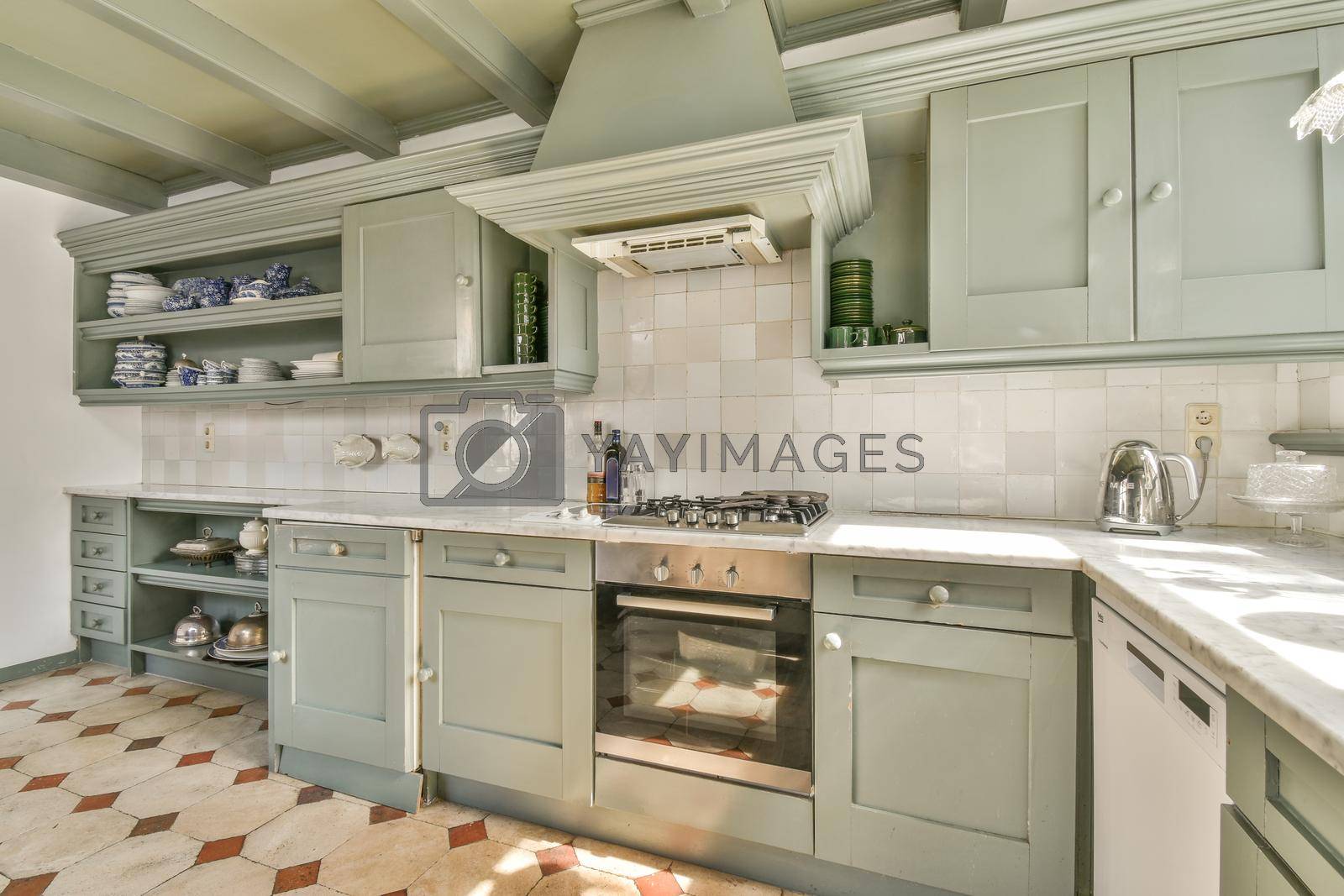 Royalty free image of Bright and modern kitchen design by casamedia