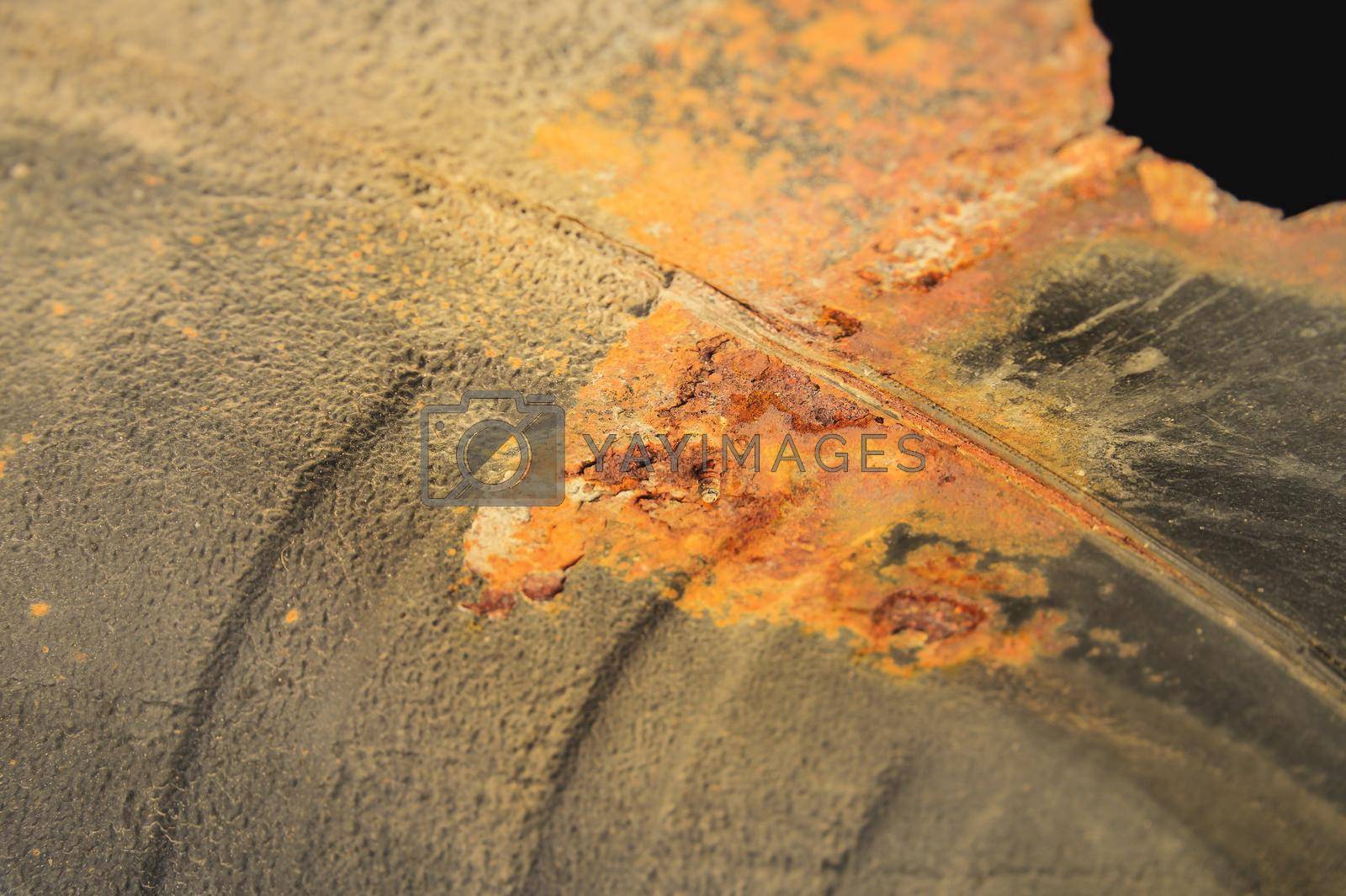 Royalty free image of rusty surface with a hole. background with texture by yanik88