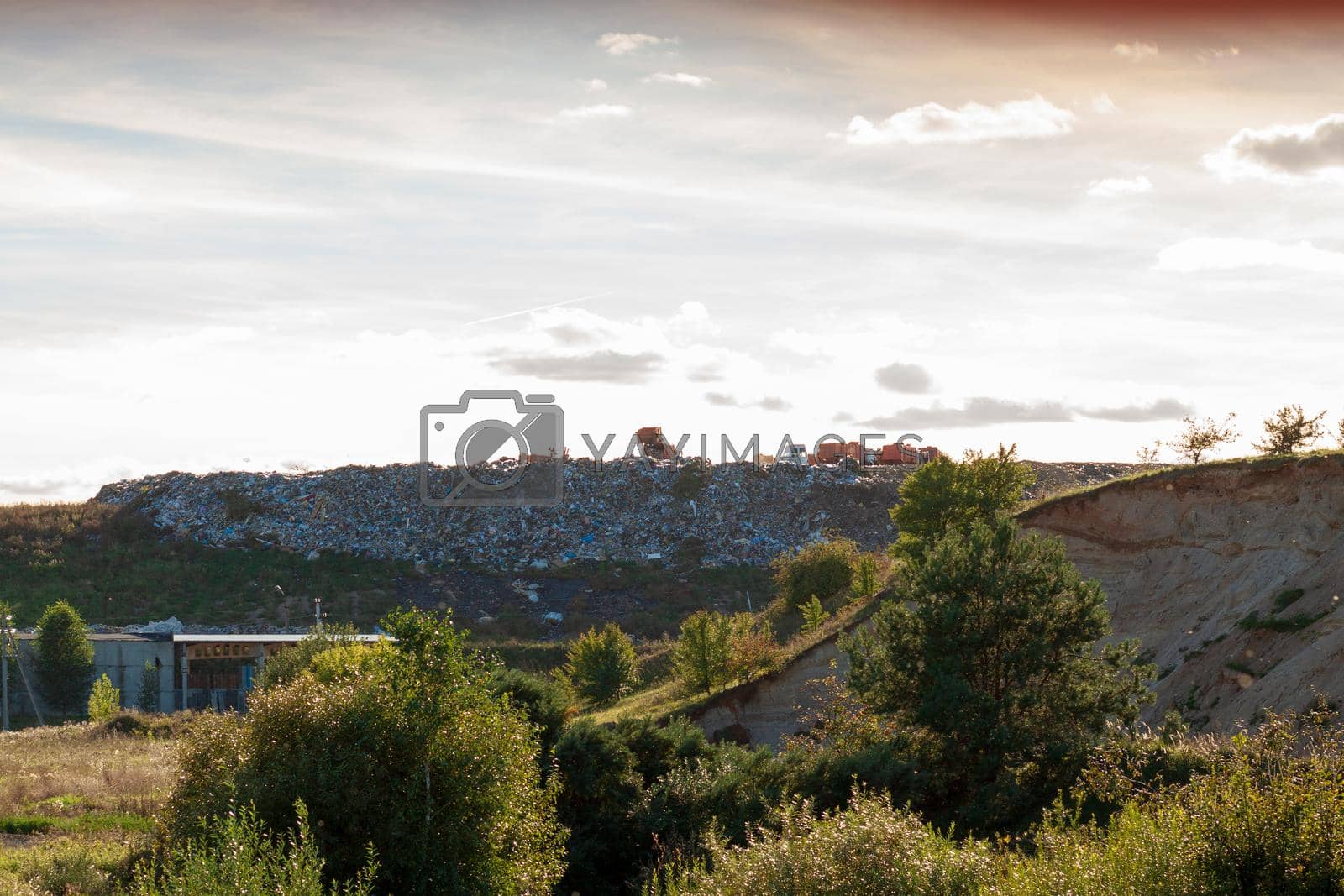 Royalty free image of View of the city dump in the evening. by BY-_-BY