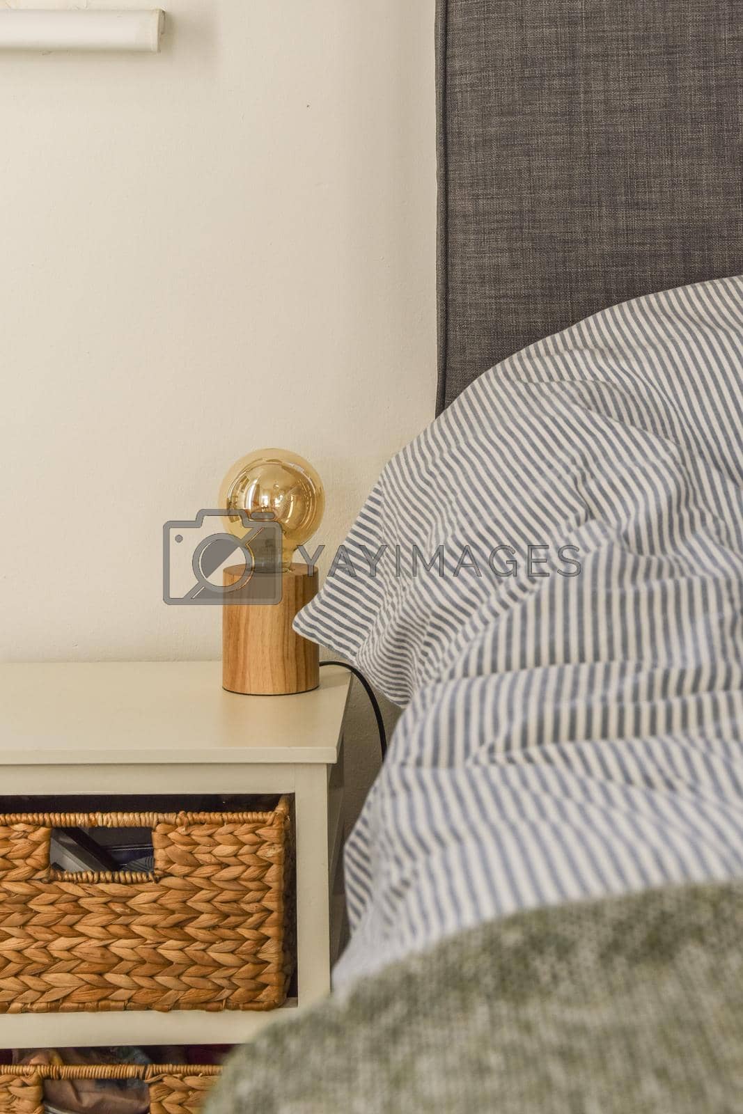 Royalty free image of Bed and chairs in bedroom by casamedia