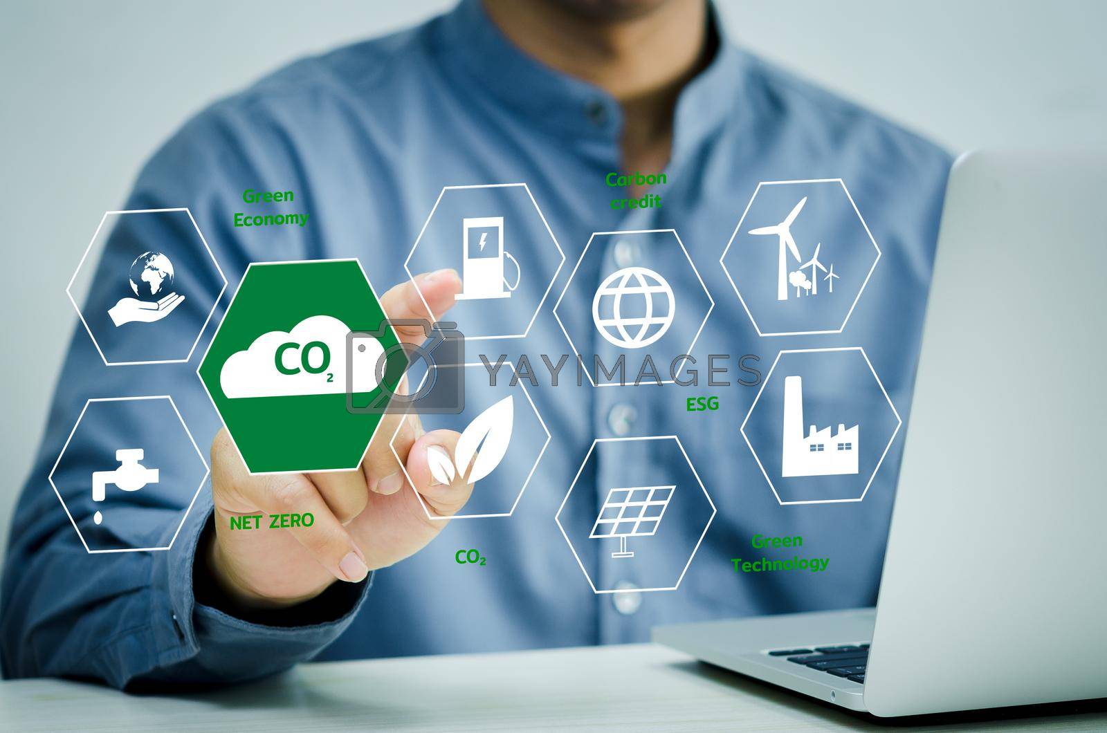 Royalty free image of businessman hand touches global warming Renewable energy a virtual screen. Reduce CO2 emissions. Sustainable business development concept. by aoo3771