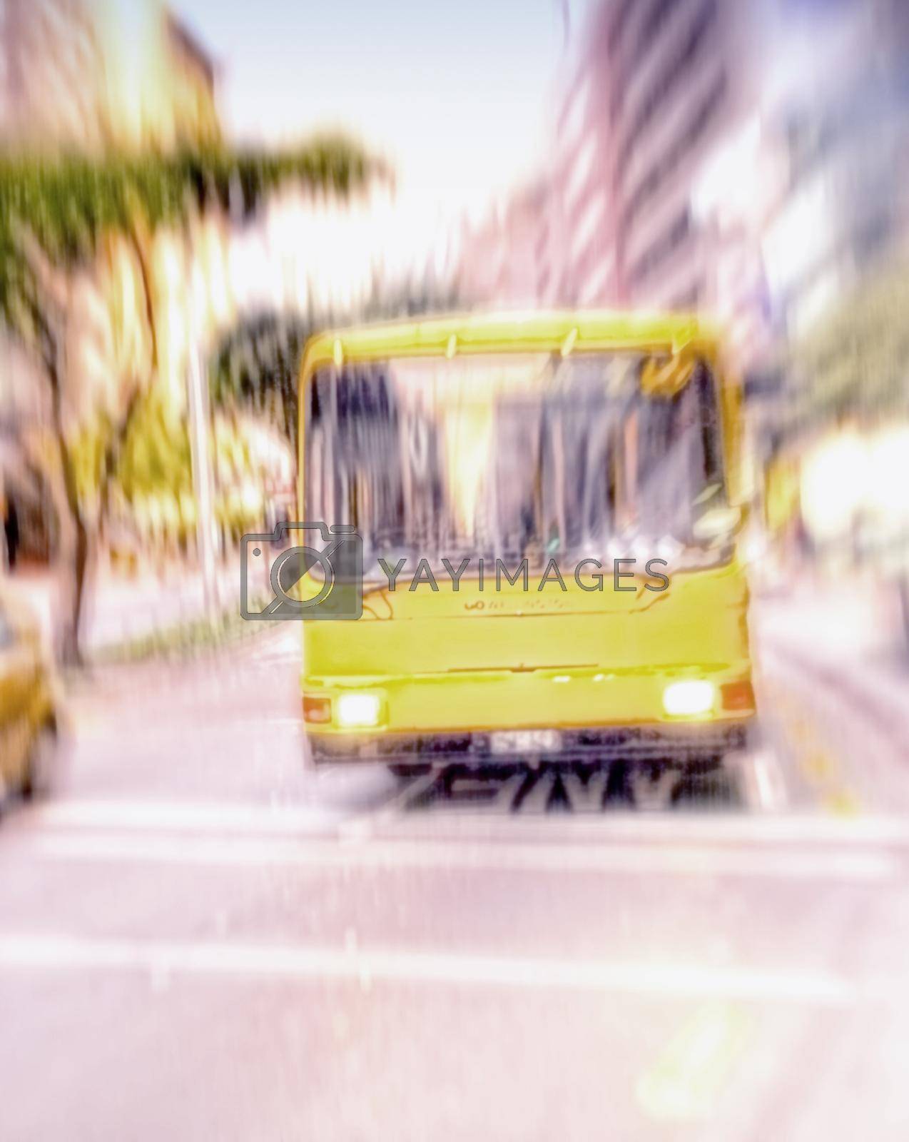 A yellow bus driving and traveling through a bust scene in the city. Commuting through a busy urban town, using public transport to travel the roads and streets to get to a destination.
