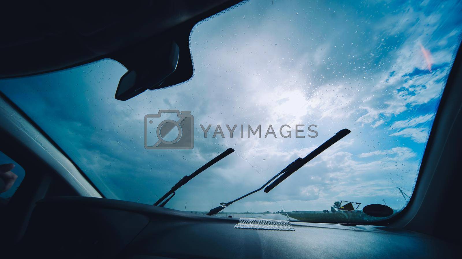 Royalty free image of The work of car brushes in the rain. by DovidPro