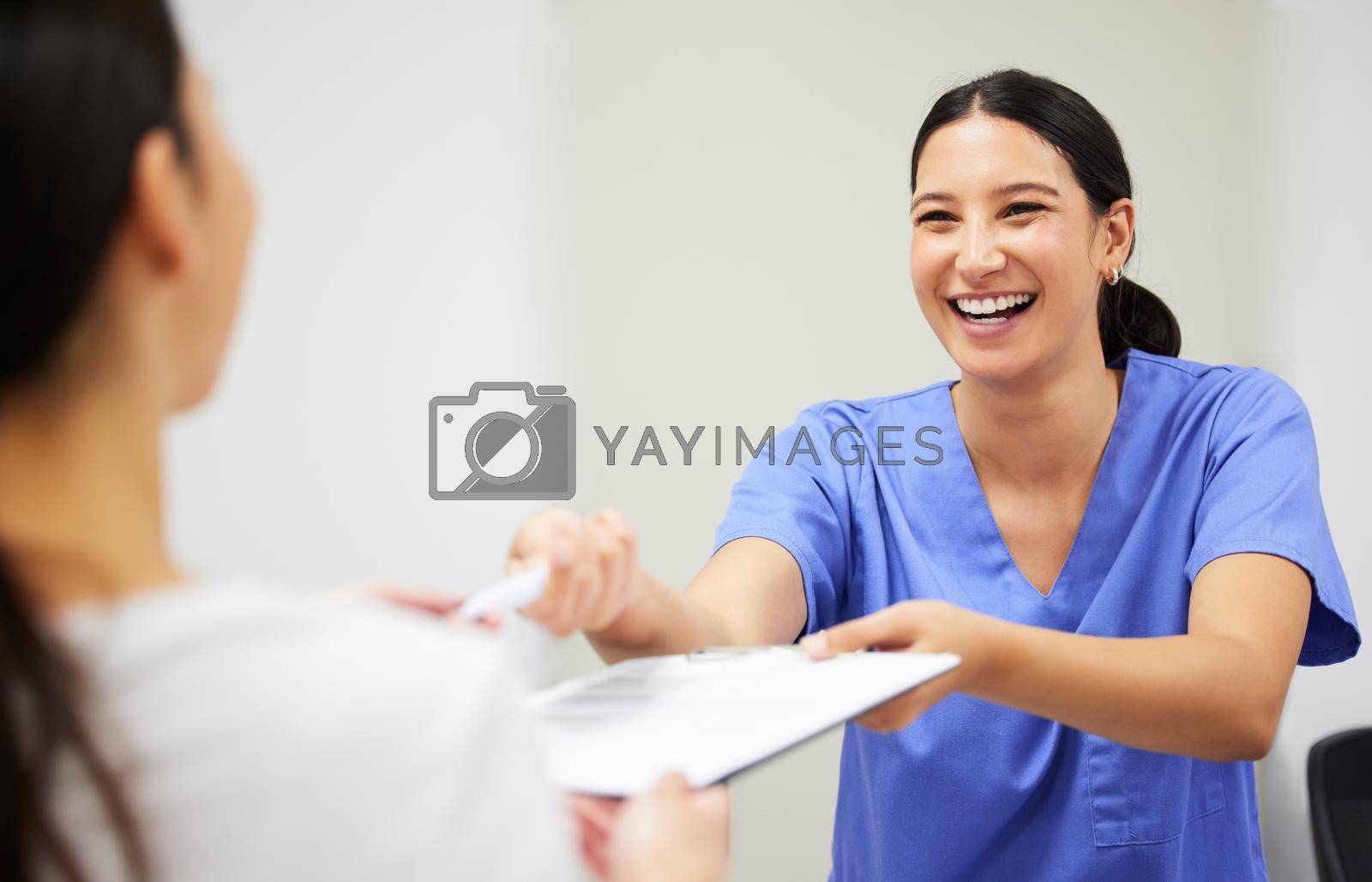 Royalty free image of I was created to create beautiful smiles. a patient and assistant interacting in a dentist office. by YuriArcurs