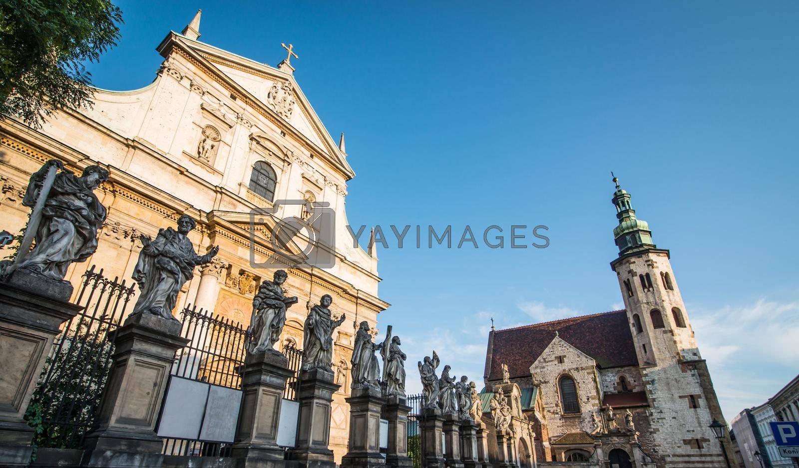 KRAKOW, POLAND - AUGUST 24: The early Baroque Church of St. Peter and St. Paul and the statues of the twelve apostles on Grodzka in the city of Krakow in Poland on 24 august 2013. Dates from 1596.