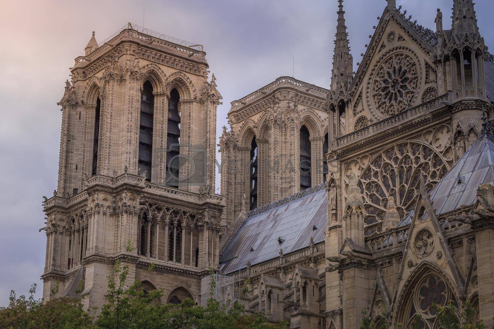 Royalty free image of Notre Dame of Paris towers, columns and archs, side view, France by positivetravelart