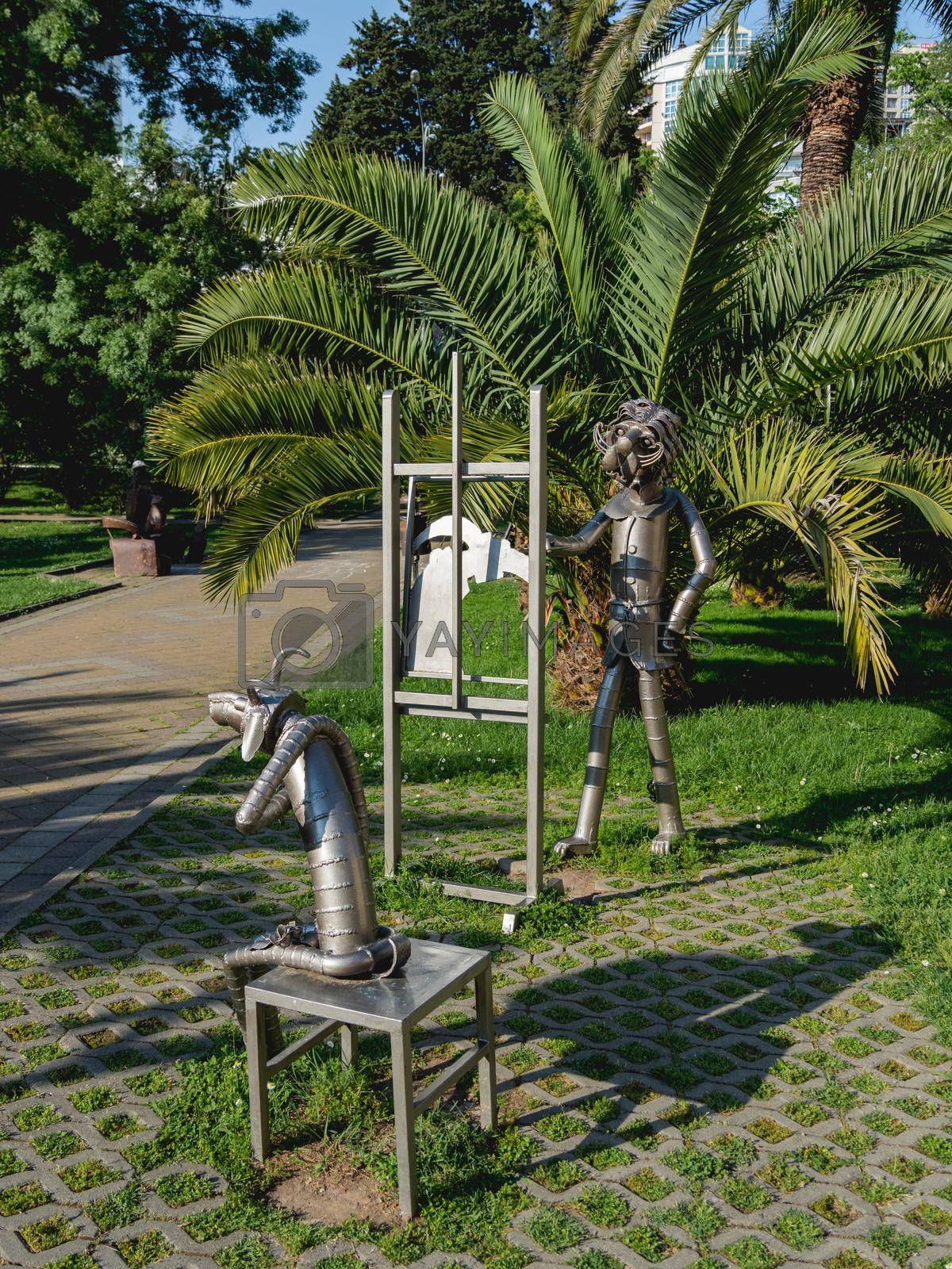 SOCHI, RUSSIA - May 27, 2021. Metal statues of animal artist and model by Hakob Khalafyan near Art Museum.