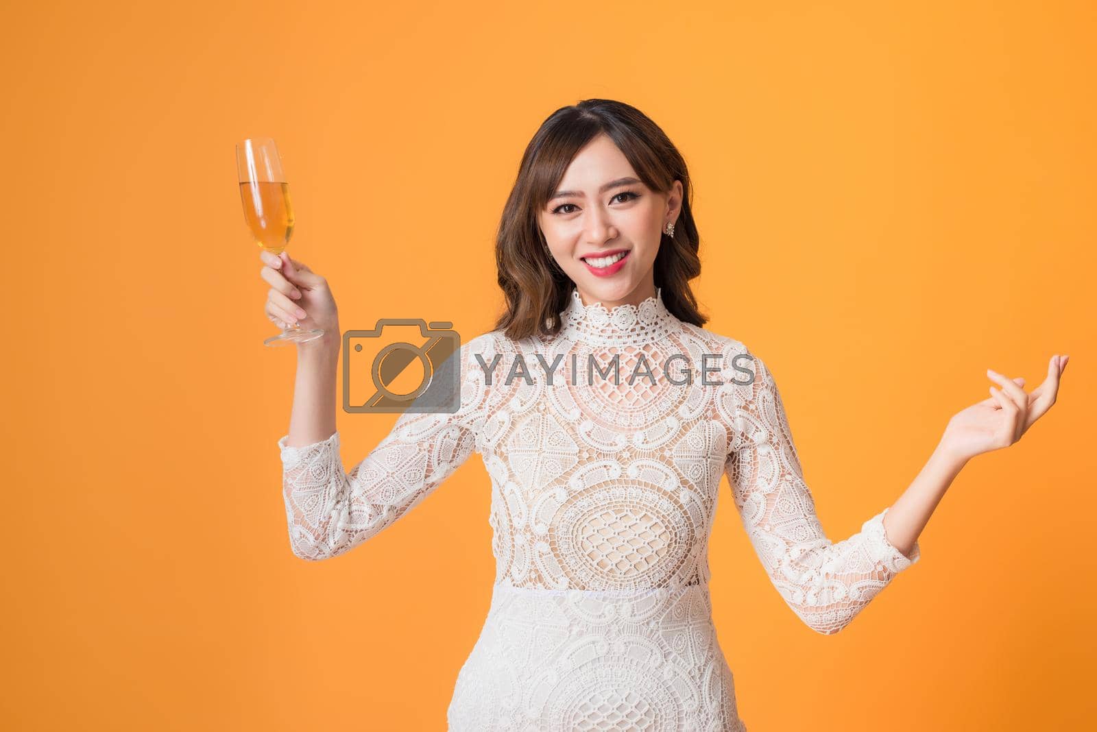 Royalty free image of Happy asian woman enjoying her sweet beverage and smiling. by makidotvn