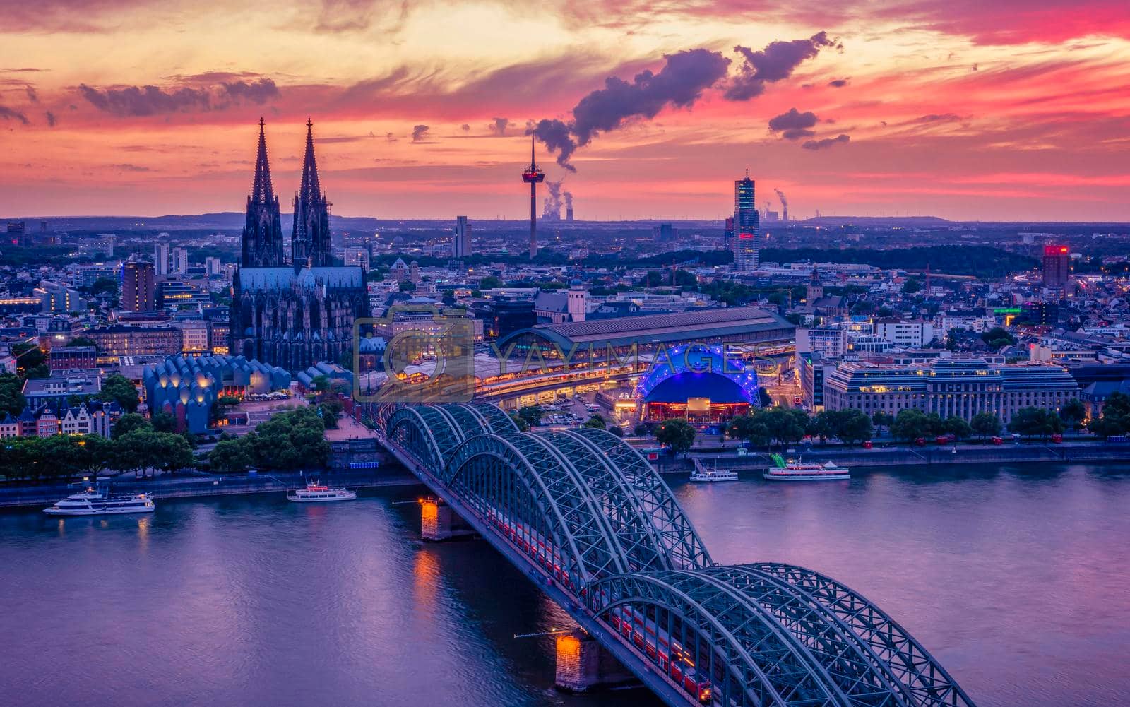 Royalty free image of Cologne Koln Germany during sunset, Cologne bridge with cathedral by fokkebok