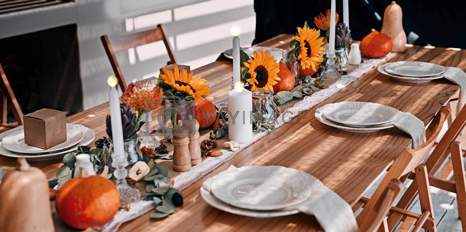 All thats missing now is you. a table set up for a Thanksgiving celebration at home